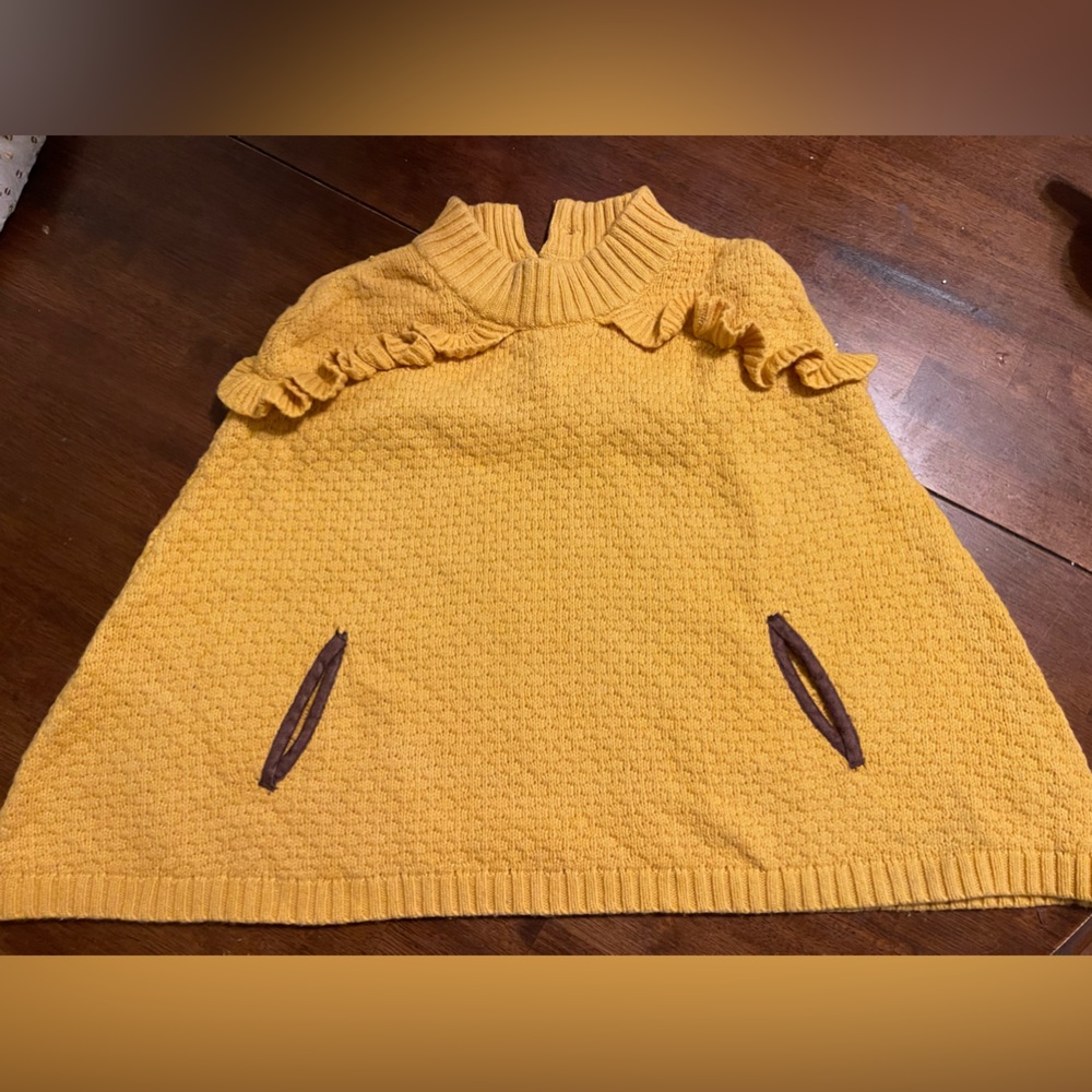 Yellow sweater poncho